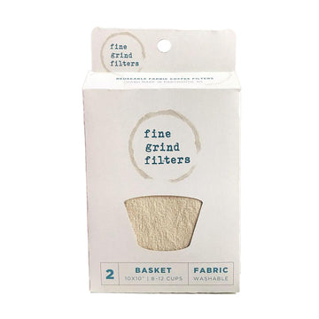 A white package with coffee stains on it that says fine grind filters. There’s a cut out in the shape of a basket filter.