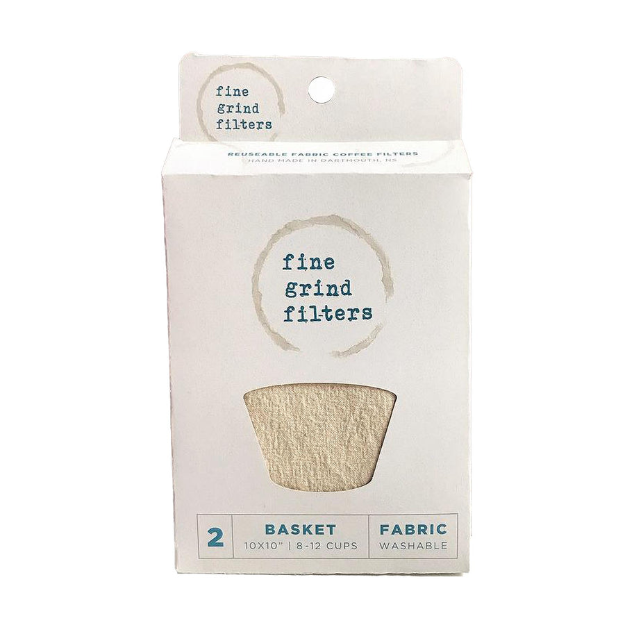A white package with coffee stains on it that says fine grind filters. There’s a cut out in the shape of a basket filter.